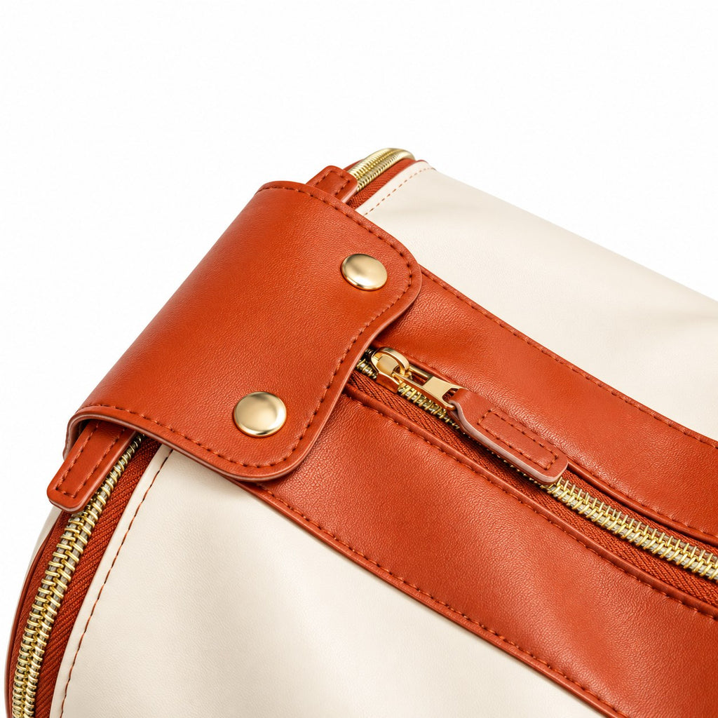 Snap end panel on the Ivory bag