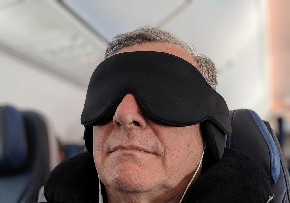 Traveler resting upright with the JetNod mask on
